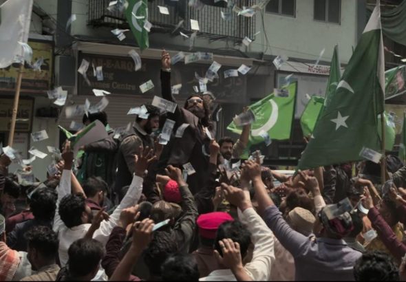 Dhurandhar The Revenge movie poster showing lead actor in action scene