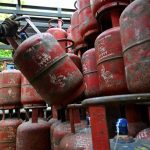 Hyderabad police seizing LPG cylinders during raid in Banjara Hills graveyard