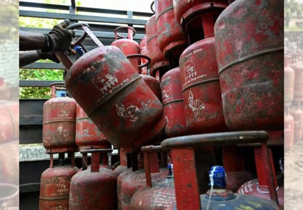 Hyderabad police seizing LPG cylinders during raid in Banjara Hills graveyard