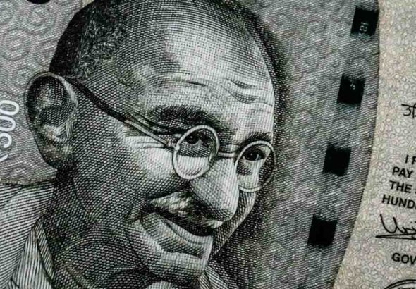Rupee hits record low